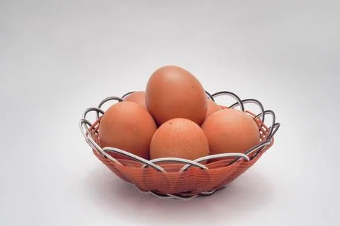 Egg in the basket Stock Photos