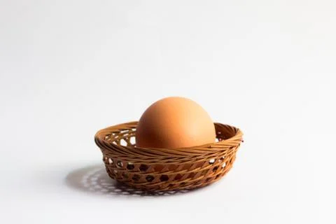 Egg in basket wicker on white background,Duck eggs in baskets . Stock Photos