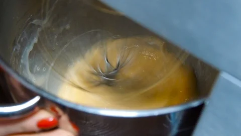 Egg beater mixer in the container Stock Footage 91549052