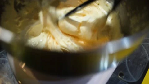 Egg beating mixing process close up Stock Footage 228068185