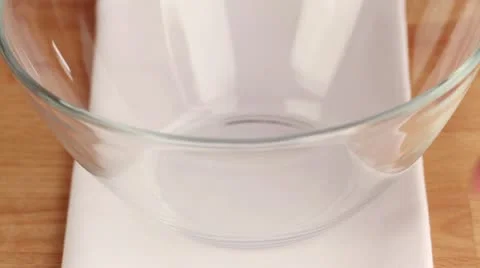 An egg being beaten in a bowl Stock-Footage 24669992