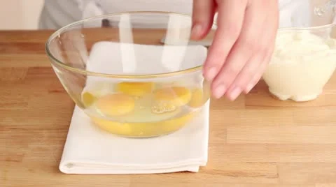 An egg being beaten in a bowl Stock Footage 24670006