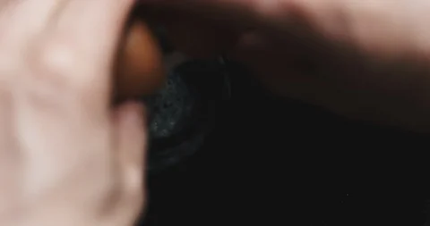 Egg being dropped on hot pan Stock Footage 88009660