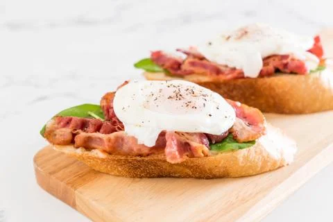 Egg benedict on board Stock Photos