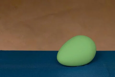 Egg on a bicolor background. Easter egg. Stock Photos