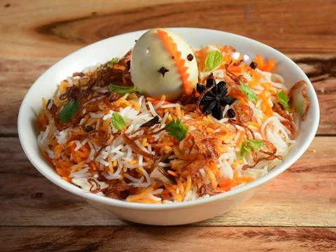 Egg Biryani - Basmati rice cooked with masala and spices and served with boil Stock Photos
