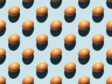 Egg on a blue background, banner, rhythmic pattern. Stock Photos