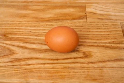 Egg on the board Stock Photos