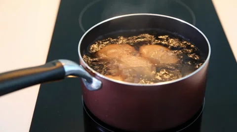 Egg Boiling on Electric Stove Stock Footage 34077292