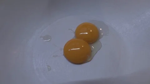 Egg into the bowl Stock Footage 127093939