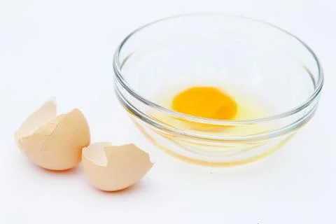 Egg in a bowl Stock Photos