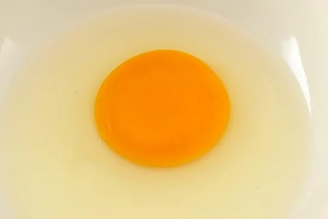 Egg in bowl Stock Photos
