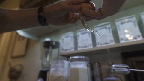 Egg braking in hand Stock Footage 127090980