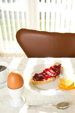 Egg, bread with jam Stock Photos