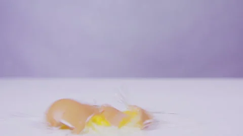 Egg breaking in slow motion Stock Footage 58761427