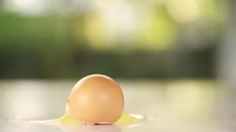 Egg breaking on the white table Stock Footage 51926439