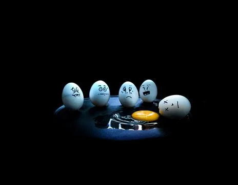 Egg breaks Stock Photos