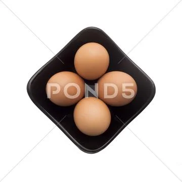 Egg, Brown Eggs in Square Black Plate, Isolated on White Background Stock Photos