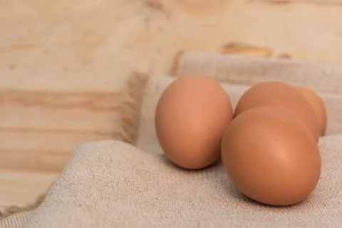 Egg on a burlap sack Stock Photos