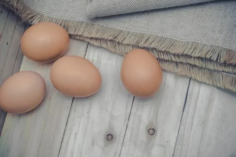 Egg on a burlap sack Stock Photos