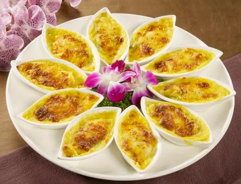 Egg cake in small tray on white plate in asian restaurant Stock Photos