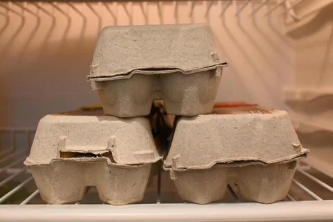 Egg cartons in a refrigerator Stockfoto's