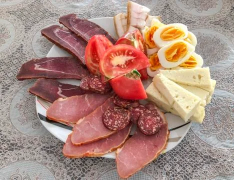 Egg, cheese and ham on table for breakfast Stock Photos