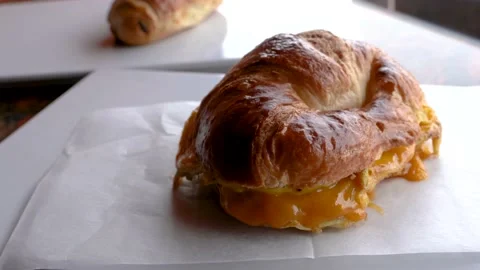 Egg cheese on a croissant Stock Footage 131919352