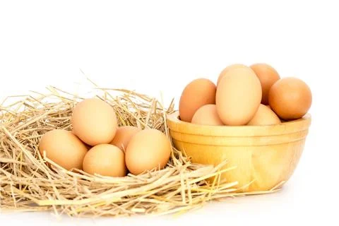 Egg, Chicken Eggs in a basket and a bowl Stock Photos