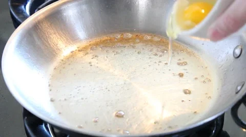 Egg cooking Stock Footage 46053324