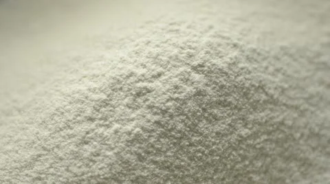 Egg cracked on to flour Stock Footage 12659319