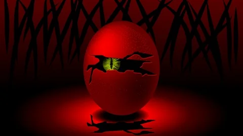 An egg with a cracked shell and a monster in the middle looking out. Stock Footage 106581702