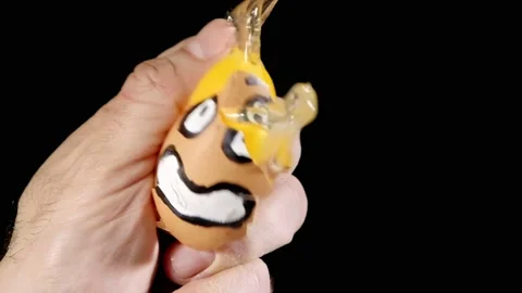 Egg crush slomo drawn face funny Stock-Footage 193054380