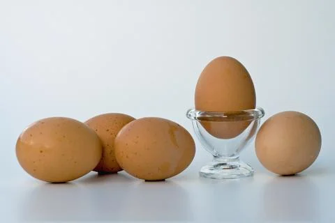 Egg cup with eggs Stock Photos