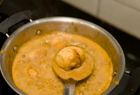 Egg Curry Cooking Stock Photos