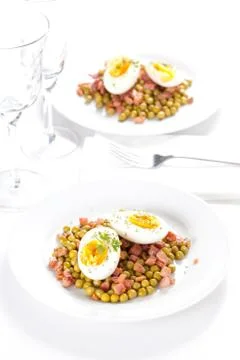 Egg dish with ham and peas Foto stock