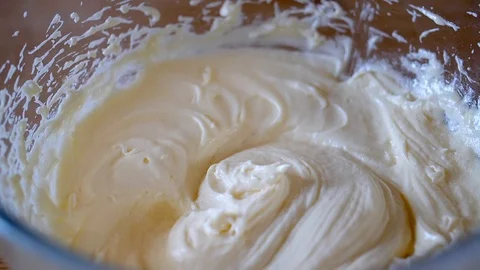 Egg dropping into bowl slow motion Stock Footage 87093433