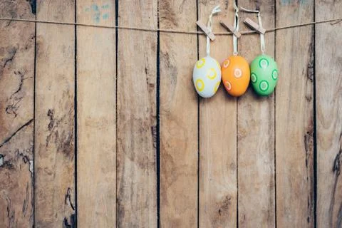 Egg easter hanging on wood background with space Stock Photos