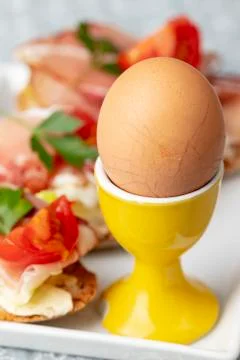 Egg in an egg cup for breakfast Stock Photos