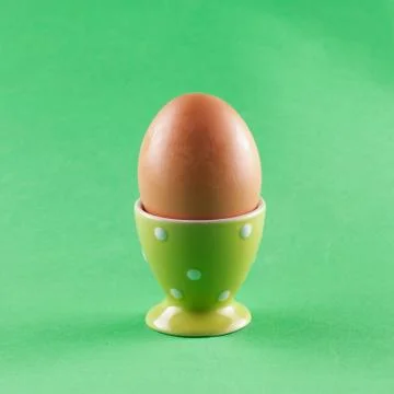 Egg in eggcup Stock Photos