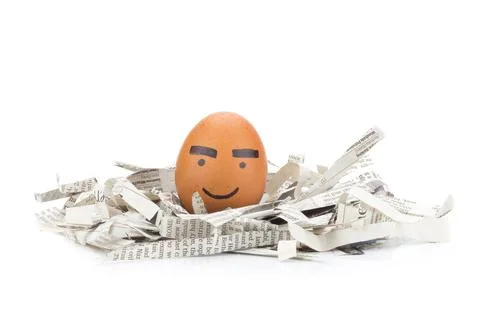Egg face thick eyebrows  on newspapers recycle 스톡 사진
