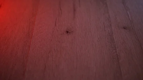 Egg fall to the floor and break. Yolk and protein slowly spread across the floor Stock Footage 124324523