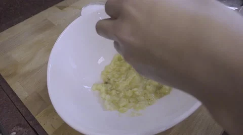 Egg falling in the bowl Stock Footage 55690204