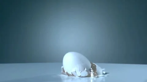 Egg falls down in slow motion and smashs - 04 - High Speed 1050fps Stock Footage 11611986