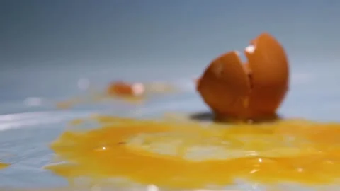 The egg falls on the table. Stock Footage 157327791