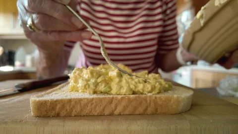 Egg filling in a sandwich Stock Footage 339968041