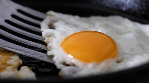 Egg-flip-1-slow Stock Footage 101582268