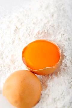 Egg on flour Stock Photos