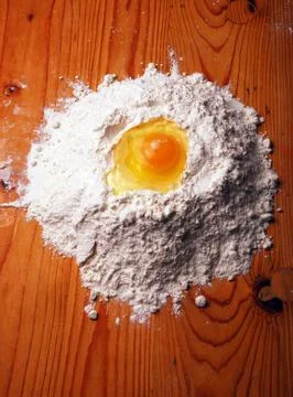 Egg with flour Stock Photos