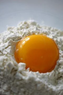 Egg flour on white background close up - baking ingredients egg yolk for br.. Foto stock